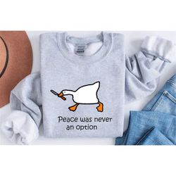 murder duck crewneck sweatshirt, untitled duck game, duck with knife meme shirt, comfy funny goose sweatshirt, peace was