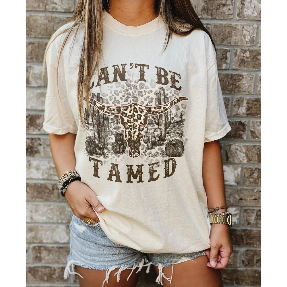 Can't Be Tamed Shirt, Western Shirt, Retro Western tee, Western Cowgirl shirt, Cow Skull shirt, Sublimation Designs tee, Country Music shirt - 1.jpg