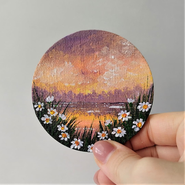 Mini-painting-on-a-magnet-with-sunset-landscape-and-daisies-refrigerator-decoration.jpg