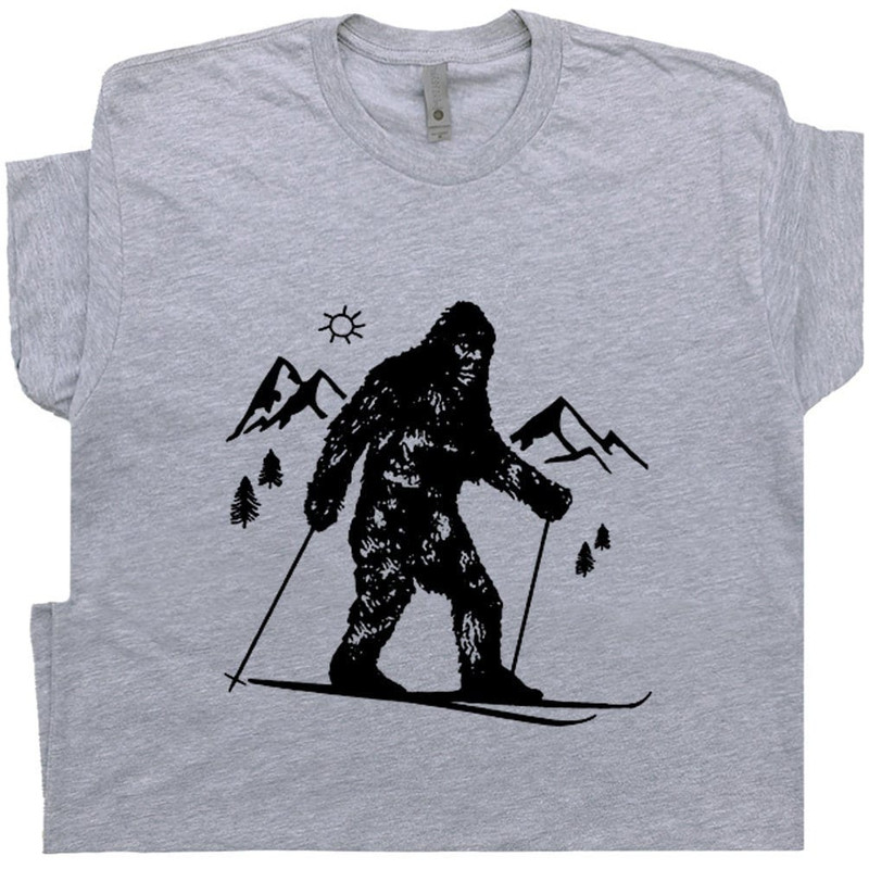 Bigfoot Skiing T Shirt Funny Skier T Shirt Cool Snow Skiing Tee Hilarious Yeti Vintage Graphic Tee Sasquatch Tshirt Mens Womens Kids Teen - 1.jpg