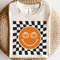 Checkered pattern happy face with pumpkin svg, Retro happy face svg, Fall pumpkin svg, Autumn shirt svg, Fall vibes svg, Halloween shirt - 1.jpg