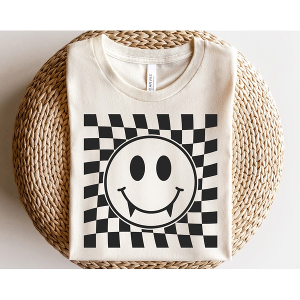 Checkered pattern happy face svg, Retro vampire face svg, Checkered Halloween shirt svg, Checkered Halloween svg, Vampire teeth svg - 1.jpg
