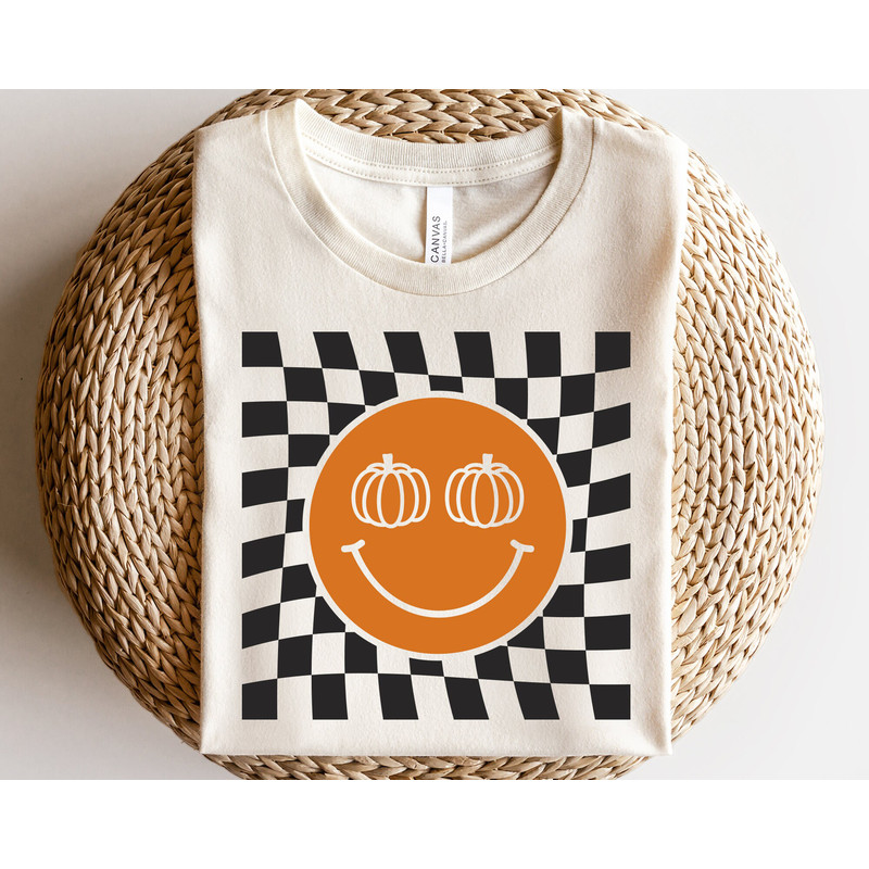 Checkered pattern happy face with pumpkin svg, Retro happy face svg, Fall pumpkin svg, Autumn shirt svg, Fall vibes svg, Halloween shirt - 1.jpg