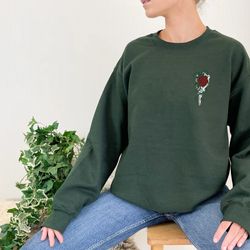 skeleton hand and rose sweatshirt perfect gift for men women and teens who love cool skull pullovers and goth art