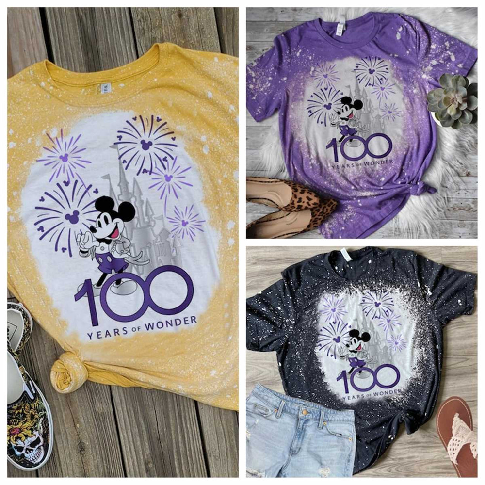 MR-1772023113645-disneys-100-years-of-wonder-bleach-washed-tshirt-fireworks-castle-and-mickey.jpg