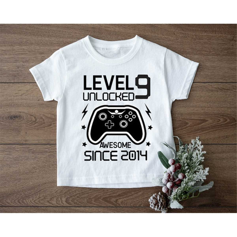 MR-187202382043-9th-birthday-shirtlevel-unlocked-awesome-since-2014-birthday-image-1.jpg