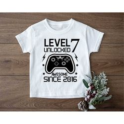 7th birthday shirt, level unlocked awesome since 2015 birthday shirt, kid gamer seven birthday tee, funny boys girls sev