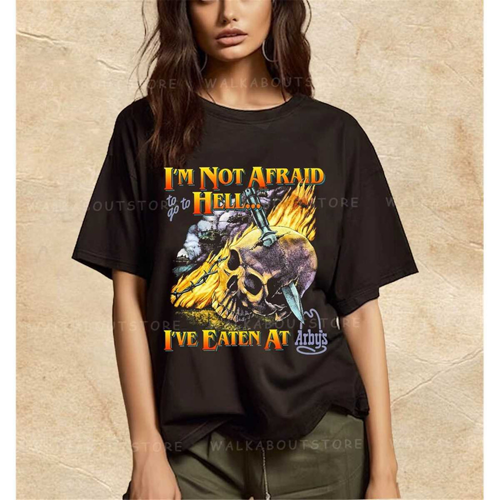 MR-18720231528-skull-im-not-afraid-to-go-hell-ive-eaten-at-arbys-shirt-image-1.jpg