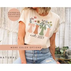 personalized wildflowers titi shirt for titi est 2023, custom gift for titi pregnancy announcement reveal to titi mother