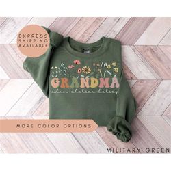 grandma sweatshirt with grandkids names,personalized grandma wildflowers sweatshirt,grandkids names sweater,grandma moth
