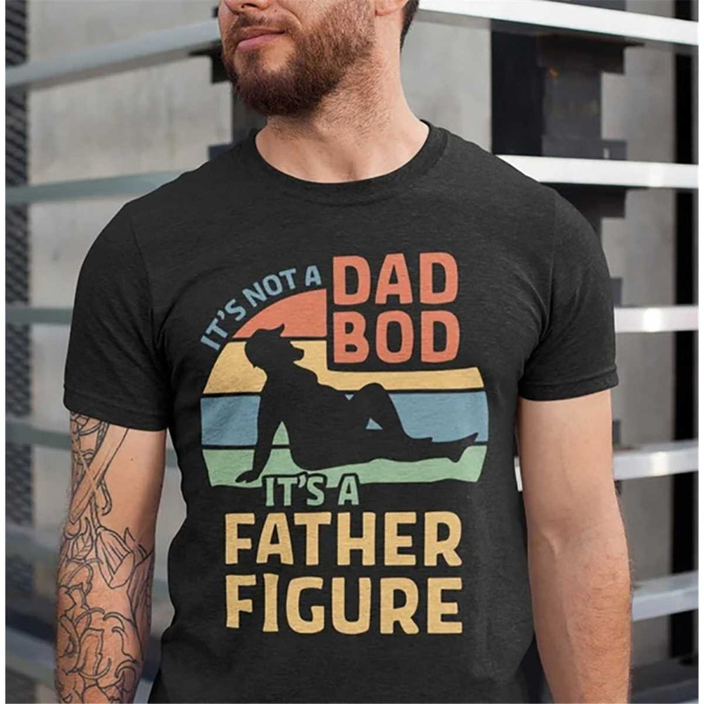 MR-217202391453-its-not-a-dad-bod-its-a-father-figure-shirt-image-1.jpg