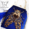 golden cicada royal blue beaded velvet bag.jpg