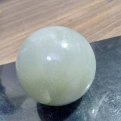 Harmonize Your Space with the Natural Beauty of our Green Aventurine Crystal Ball