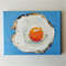 Fried-egg-painting-on-canvas-in-style-impasto-food-art.jpg