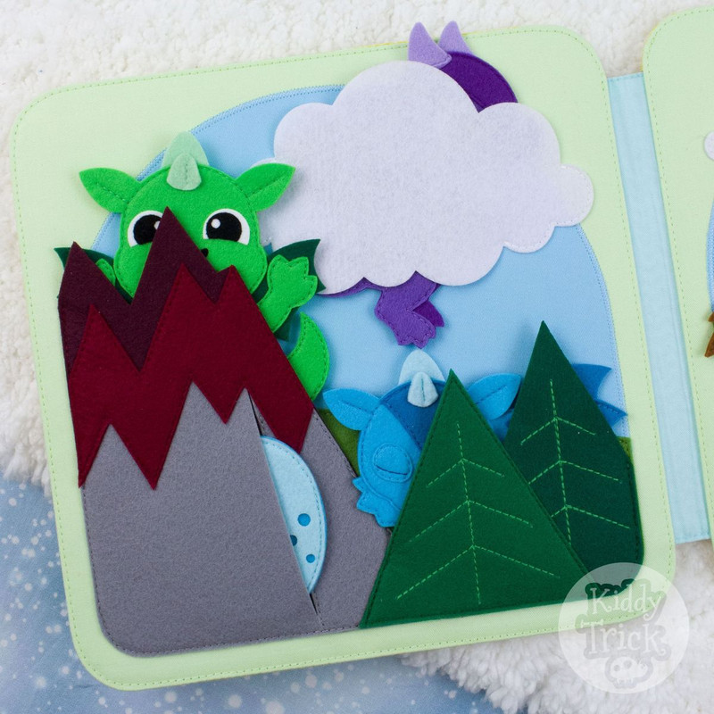 quiet book page with 3 hiding dragons