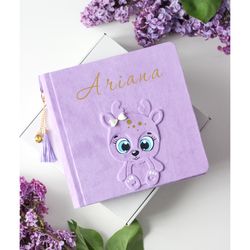 Custom baby photo guest book on 1st year photo album with a personalized, minimalist photo album