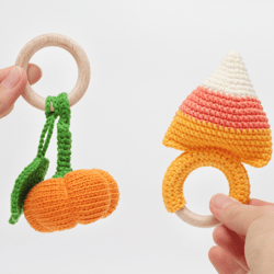 Pumpkin and candy corn rattle toys.  First Halloween baby gift