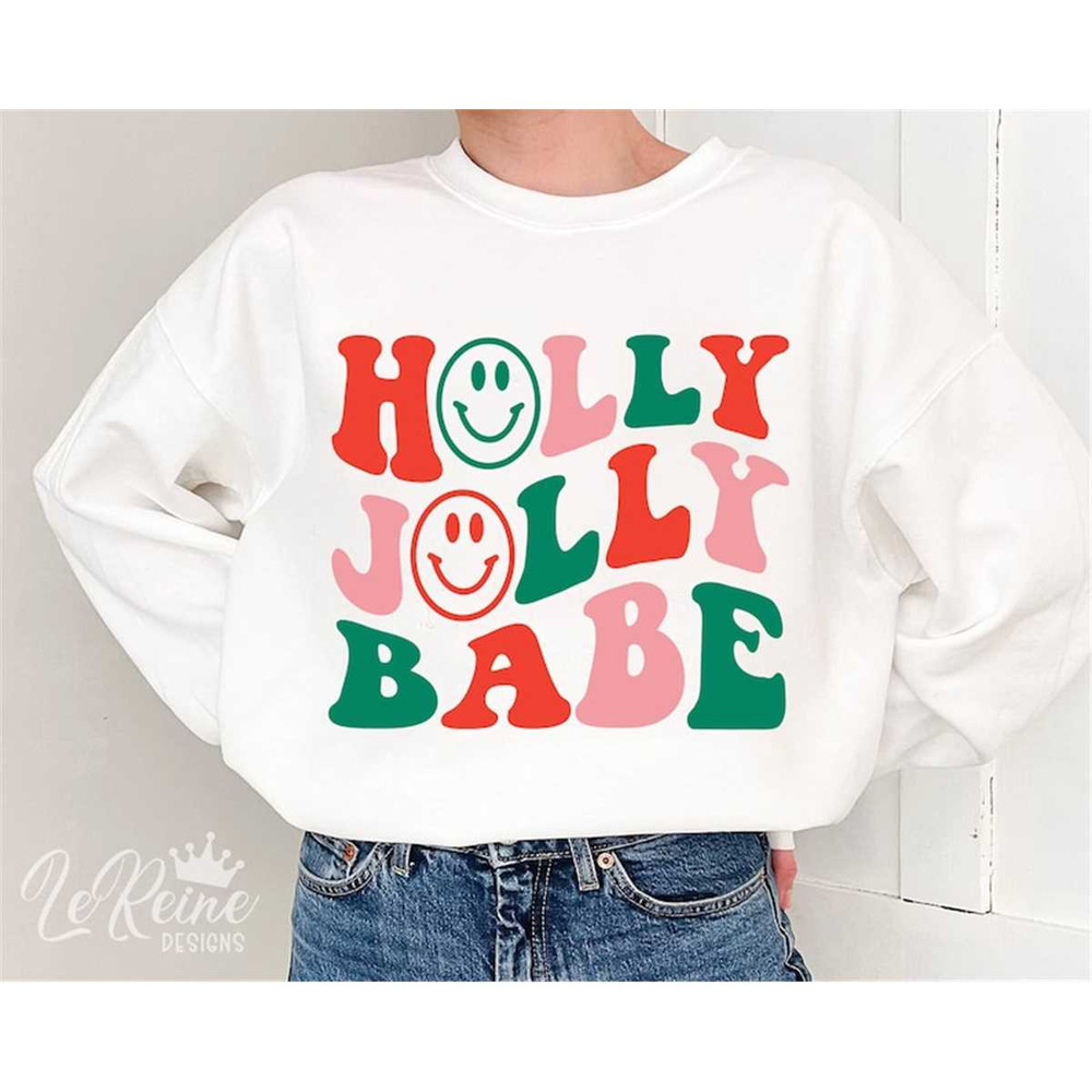 MR-38202343141-holly-jolly-babe-svg-retro-cute-trendy-women-christmas-svg-image-1.jpg