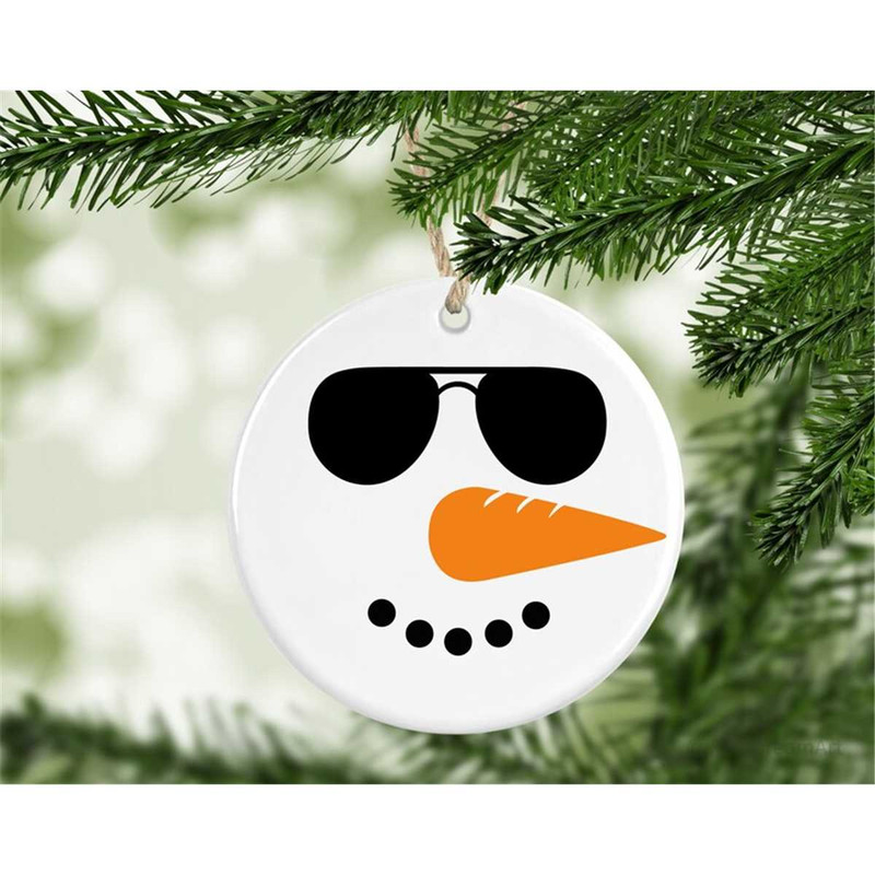 MR-58202305955-snowman-face-svg-snow-cute-svg-snowman-silhouette-shades-image-1.jpg