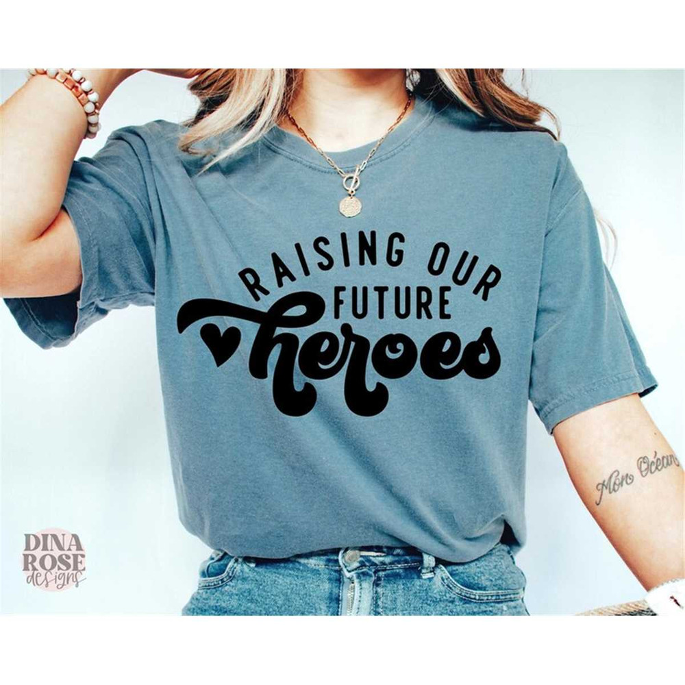 MR-78202331821-raising-our-future-heroes-svg-teacher-svg-mom-svg-mom-image-1.jpg