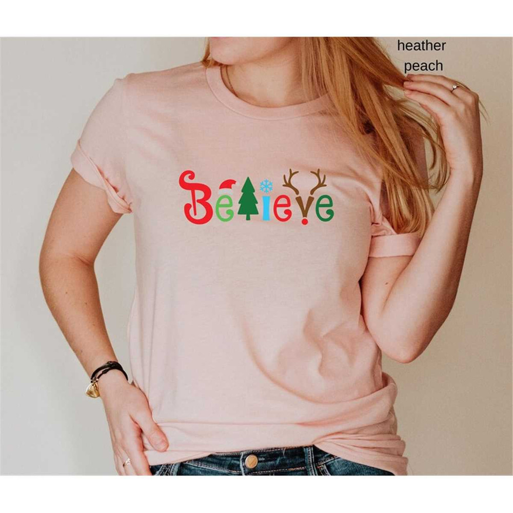 MR-882023113028-believe-christmas-t-shirt-believe-noel-shirt-funny-image-1.jpg