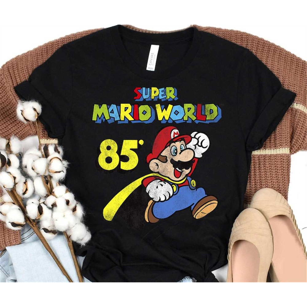MR-118202385531-nintendo-super-mario-world-cape-mario-jump-85-graphic-image-1.jpg