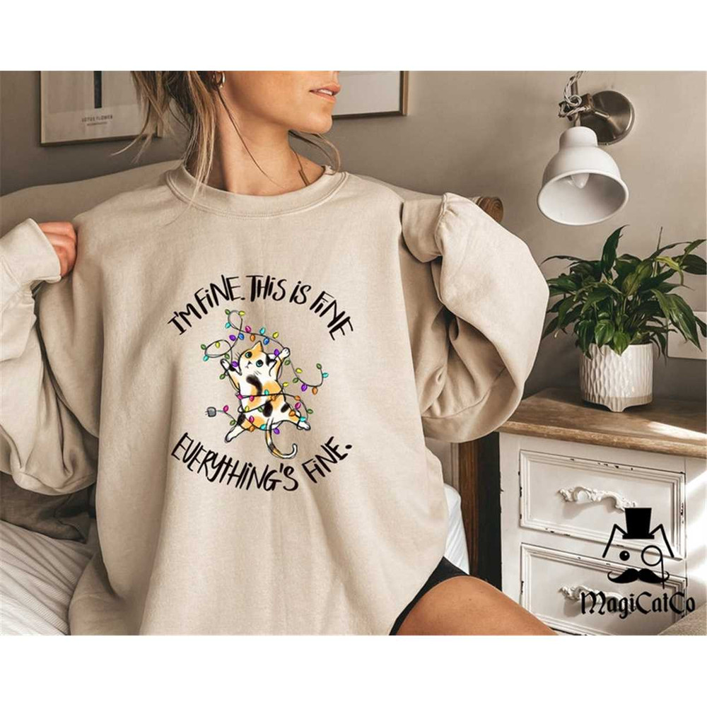 MR-1182023183051-tangled-cat-christmas-lights-sweater-this-is-fine-everything-image-1.jpg