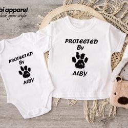 protected by dog onesie, newborn outfit, custom baby shower