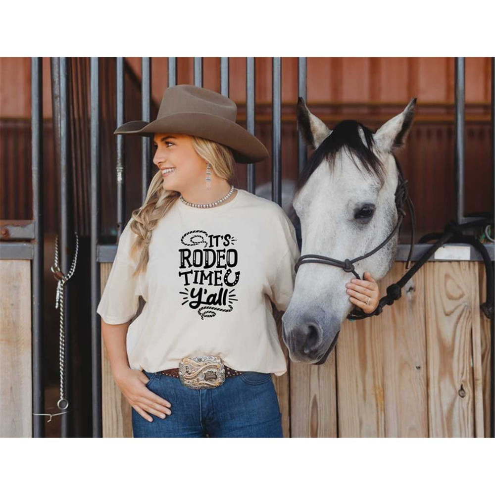 MR-168202311194-and-they-call-the-thing-rodeo-hoodie-rodeo-hoodie-trendy-image-1.jpg