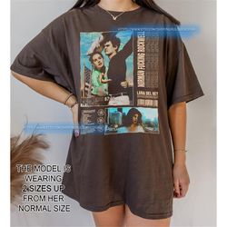 lana del rey - norman f rockwell promo poster unisex heavy cotton tee