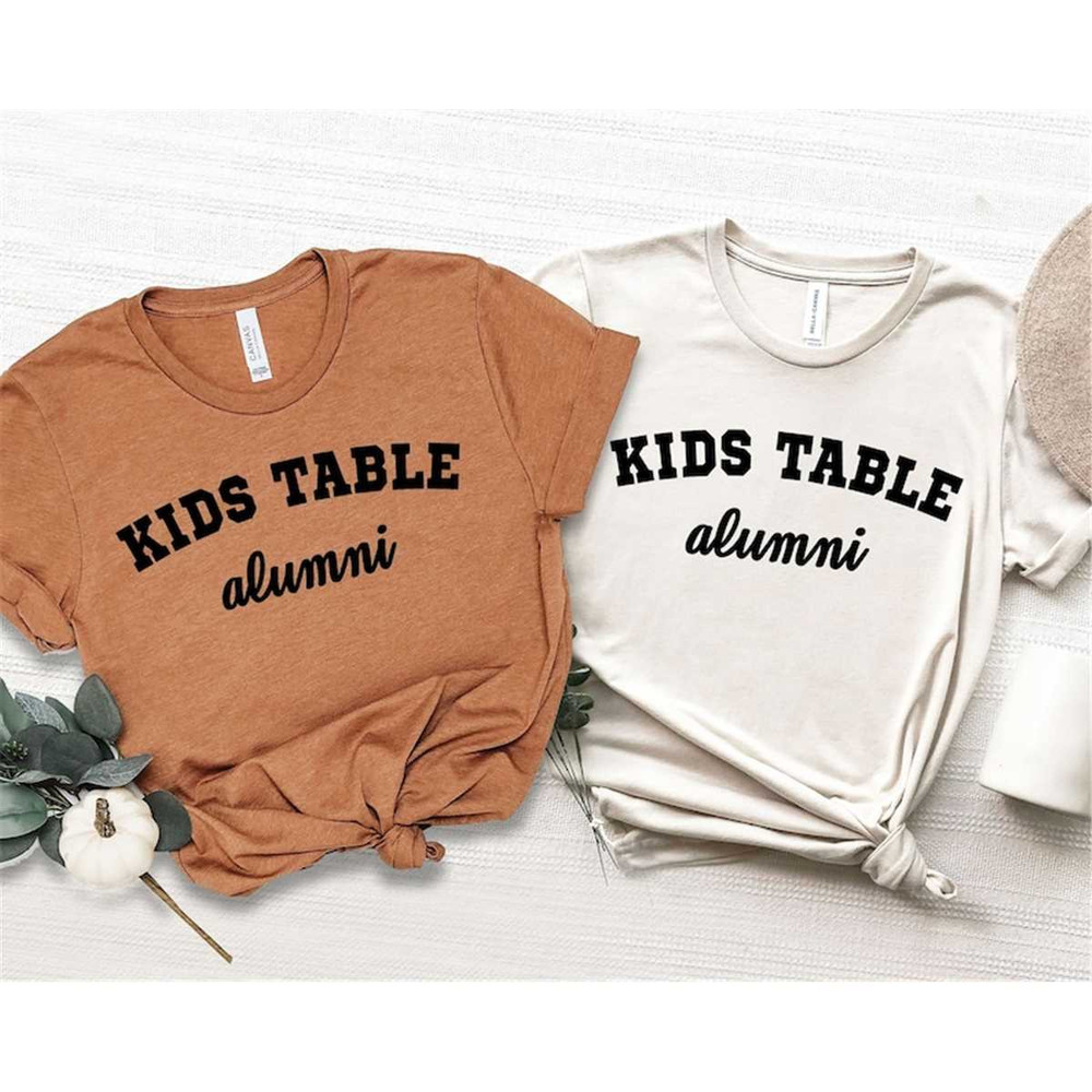 MR-1782023184642-kids-table-alumni-shirt-funny-thanksgiving-shirts-couples-image-1.jpg