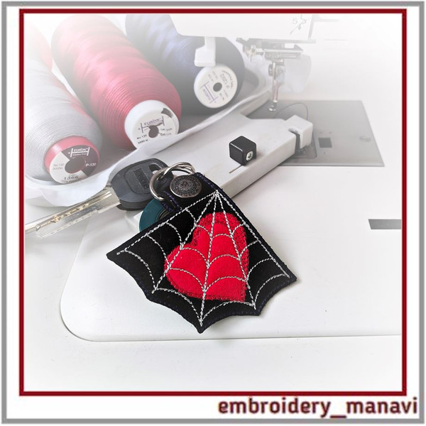 In_the_hoop_embroidery_Keychain_with_heart_in_a_spider's_web