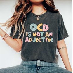 ocd is not an adjective, ocd shirt, ocd awareness shirt, ocd t-shirts, mental health shirt, mental health awareness shir