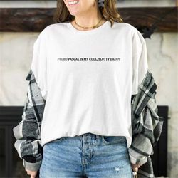 pedro pascal shirt | daddy pedro pascal shirt tlou last of us mando merch text joel miller ellie world's best daddy grog