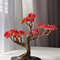 Red-bonsai-tree-on-table.jpeg
