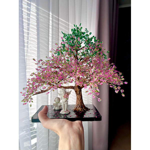 Cherry-blossom-tree-on-a-table-in-interior.jpeg