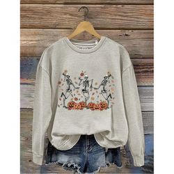 dancing skeleton pumpkin sweatshirt, skeleton pumpkin crewneck sweatshirt, halloween skeleton sweater, skeleton party sw