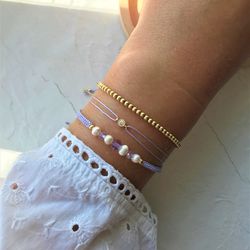 Set of light purple bracelets. Mix Bracelet - Gold & Pearl. Beaded bracelet.