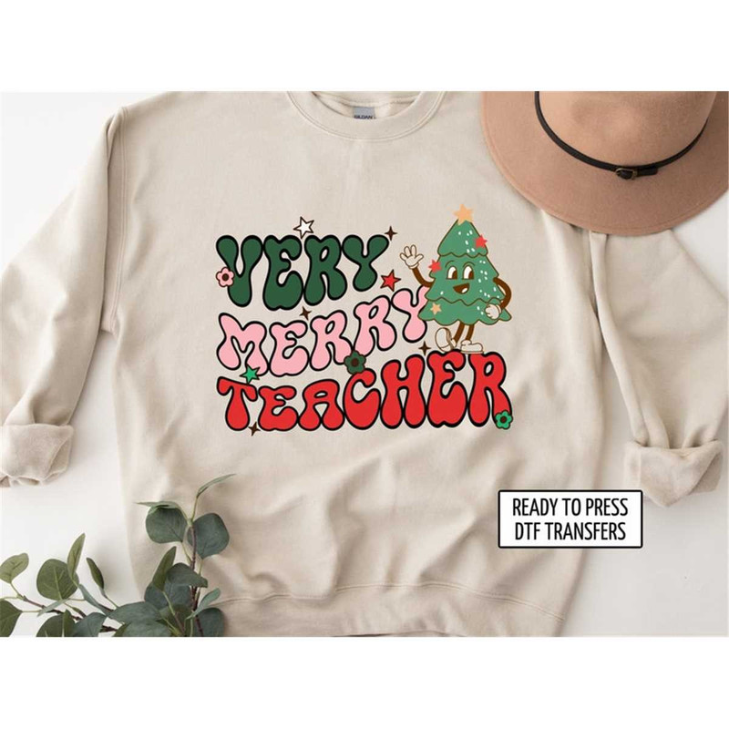 MR-2182023134127-very-merry-teacher-dtf-transfers-ready-to-press-t-shirt-image-1.jpg