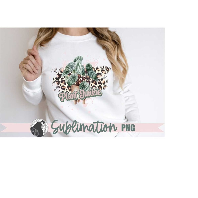 MR-228202341720-leopard-print-plant-junkie-sublimation-design-shown-on-a-white-shirt.jpg