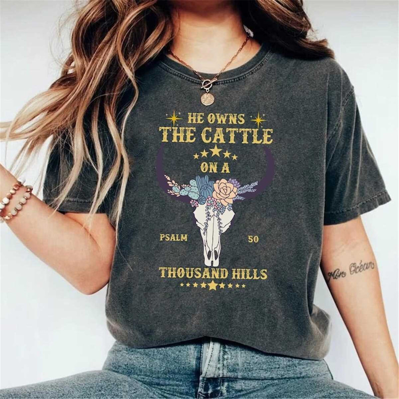 MR-238202320167-he-owns-the-cattle-on-a-thousand-hills-graphic-tee-image-1.jpg