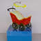 Miniature- toy- stroller- for- a -little- doll-1