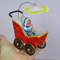 Miniature- toy- stroller- for- a -little- doll-2
