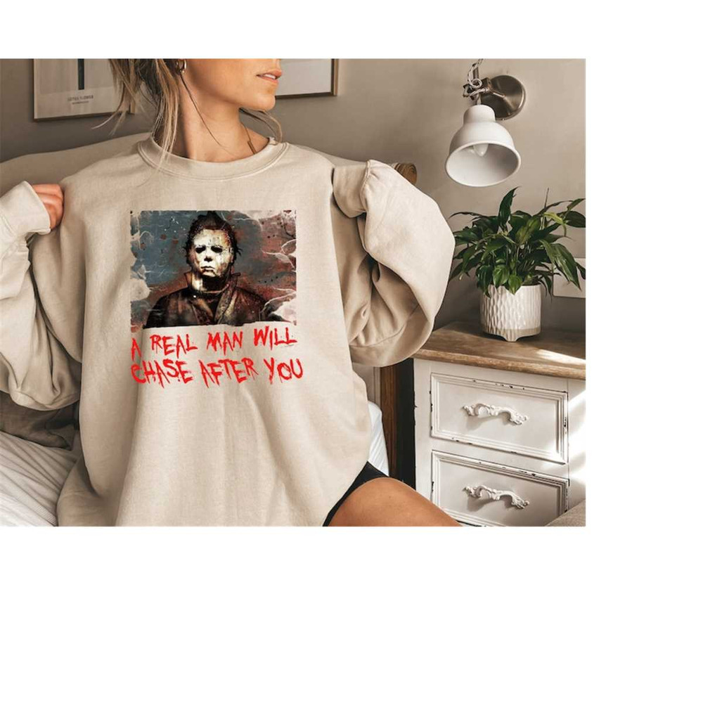 MR-248202315657-funny-halloween-sweatshirta-real-man-will-chase-after-you-image-1.jpg