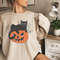 Black Cat on Pumpkin Sweatshirt, Sweater for fall, Black Cat Sweater, Halloween Black Cat Design, Halloween Gifts for Cat Owner - 1.jpg