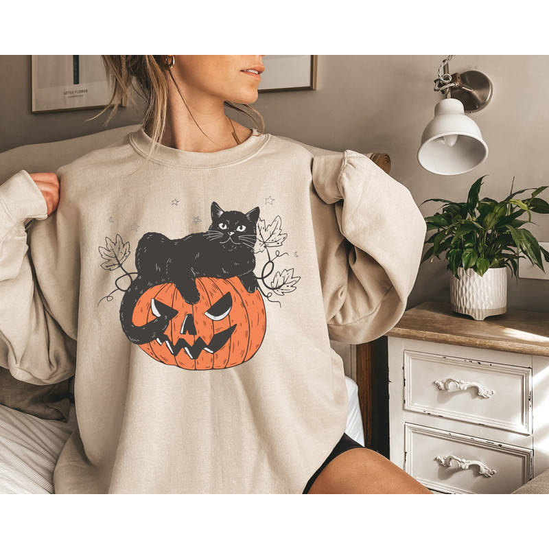 Black Cat on Pumpkin Sweatshirt, Sweater for fall, Black Cat Sweater, Halloween Black Cat Design, Halloween Gifts for Cat Owner - 1.jpg