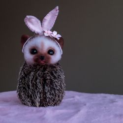 Baby hedgehog Laura. Realistic replica animal.