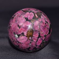 Polished cherry eudialyte sphere