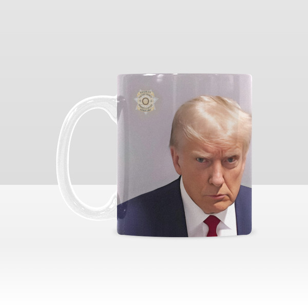 Trump Mugshot Mug.png