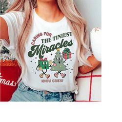christmas nicu nurse shirt, tiniest miracles winter xmas neonatal icu rn tshirt, groovy newborn nicu nurse tech tee, chr